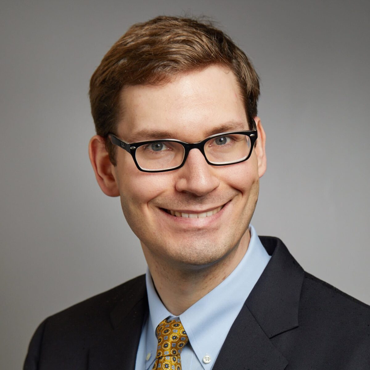Headshot photo of Benjamin Gallagher
