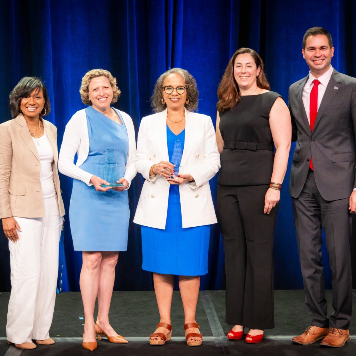 SGIM25 chairs and award winners standing onstage
