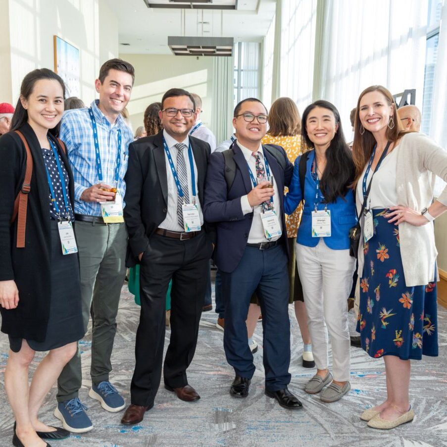 A group of six SGIM 2025 meeting attendees smiling for a photo.