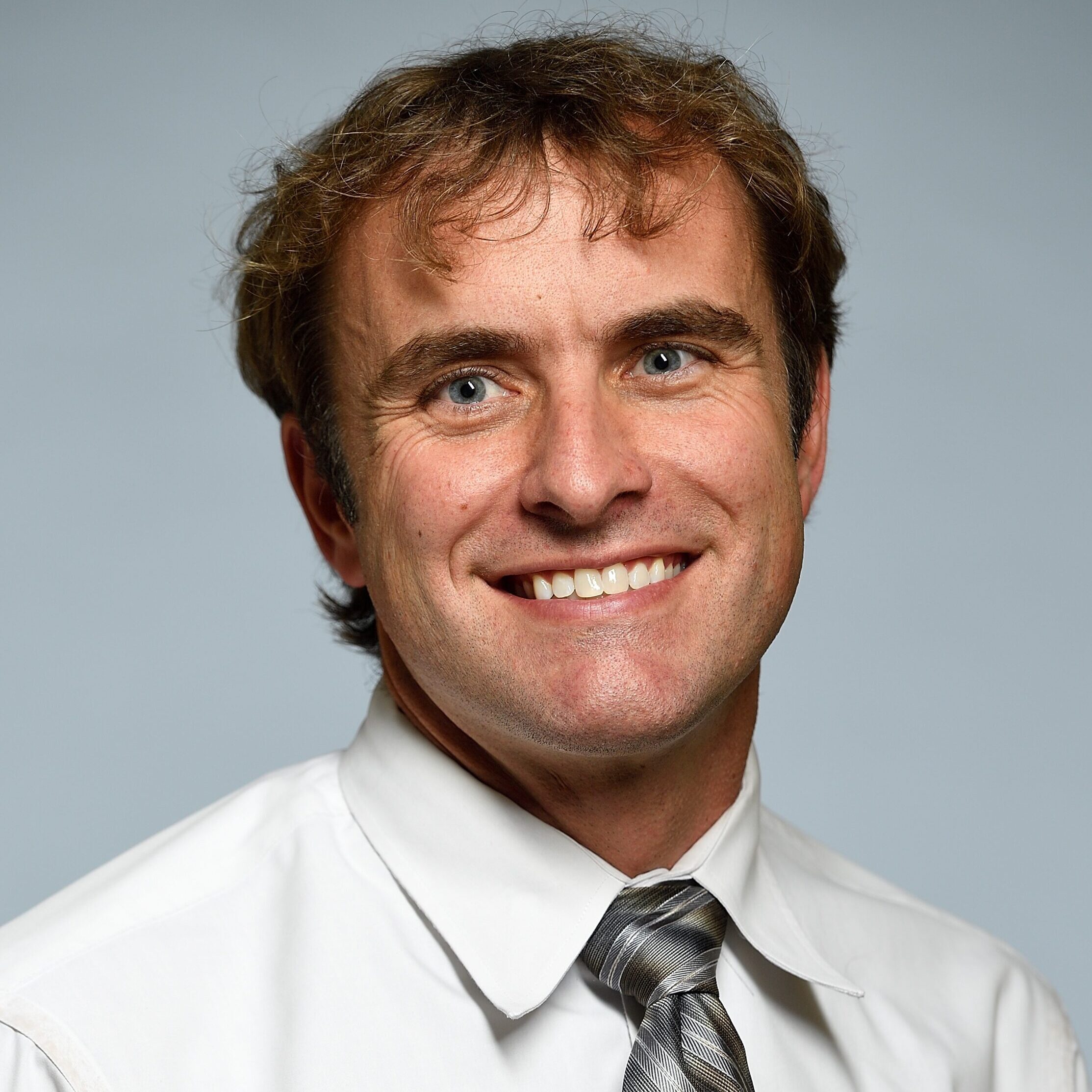 Headshot photo of Matthew DeCamp
