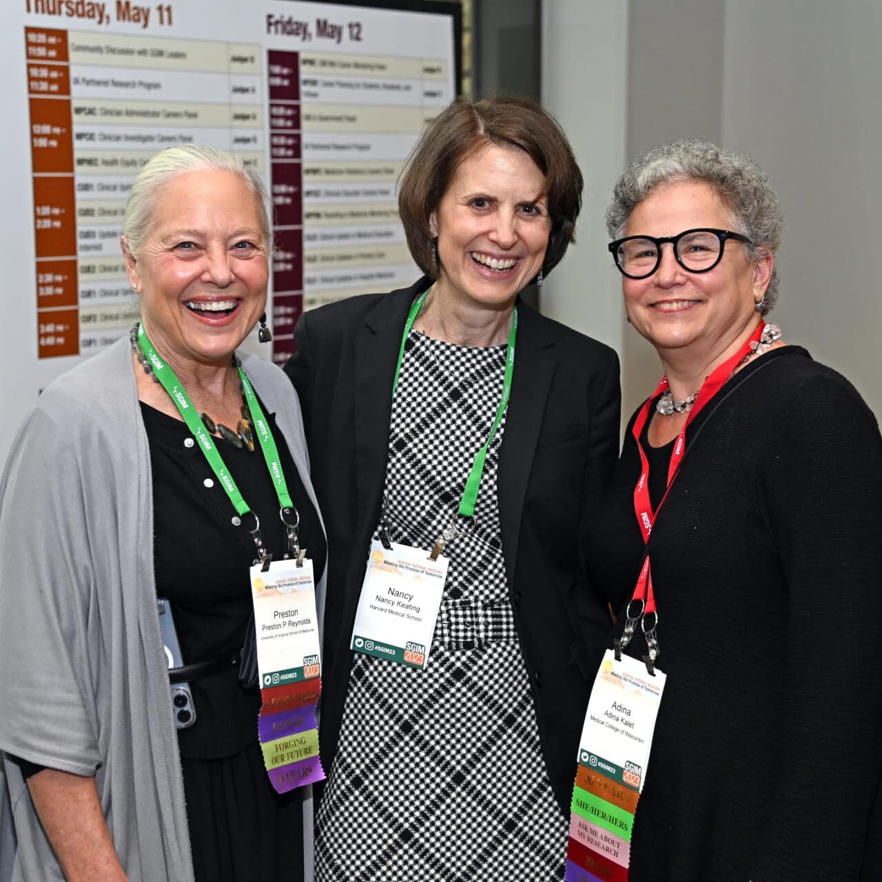 Three SGIM members with SGIM Annual Meeting badges posing for a photo.